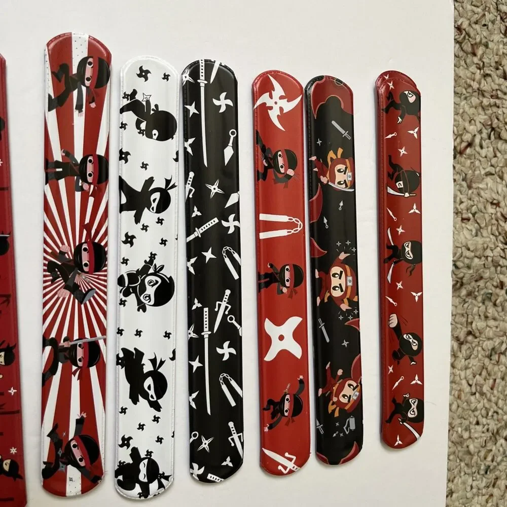 Ninja Slap Party Favor Bracelets 48 Pack Treasure Box 12 Designs 4 Each Design